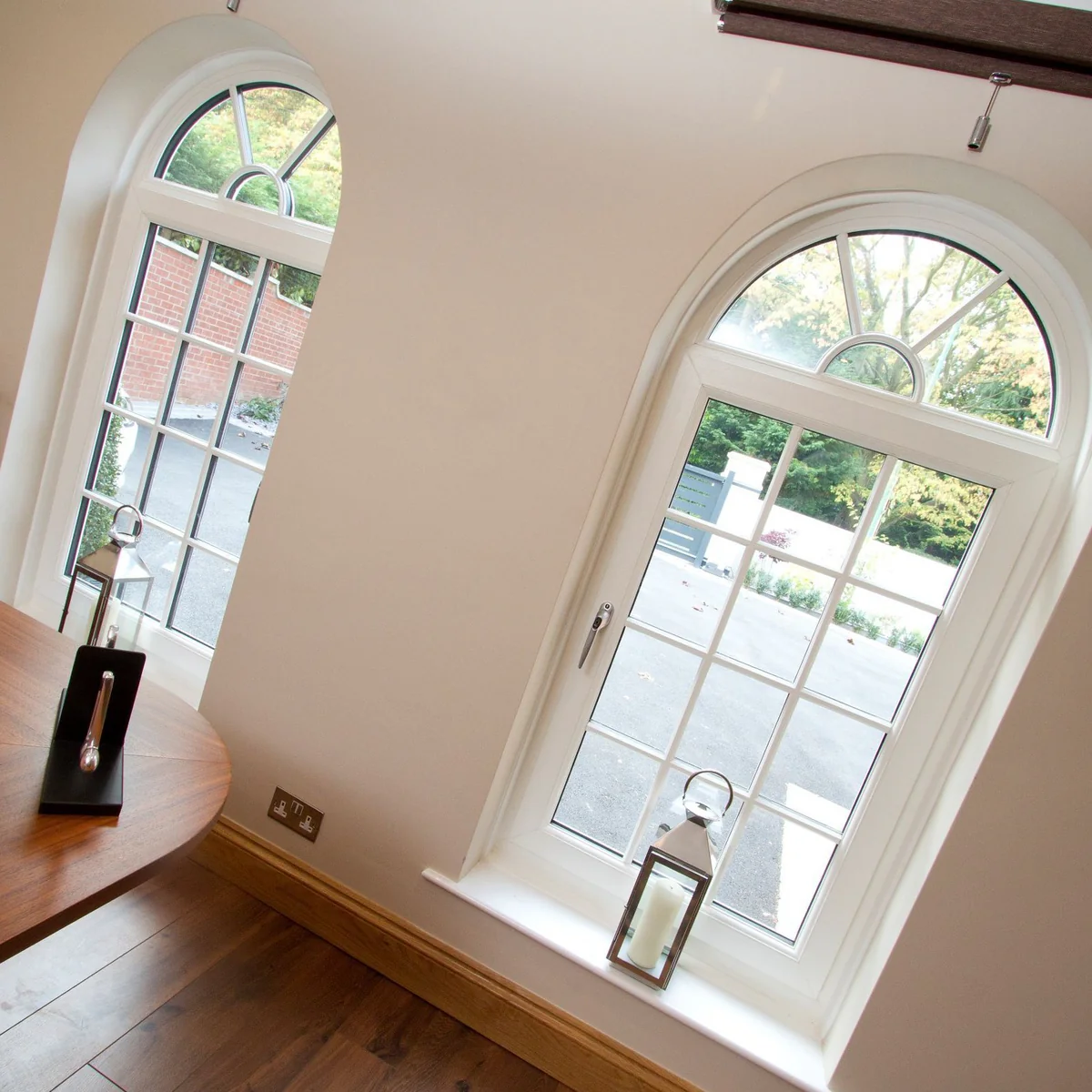 White tilt and turn windows with arched toplights