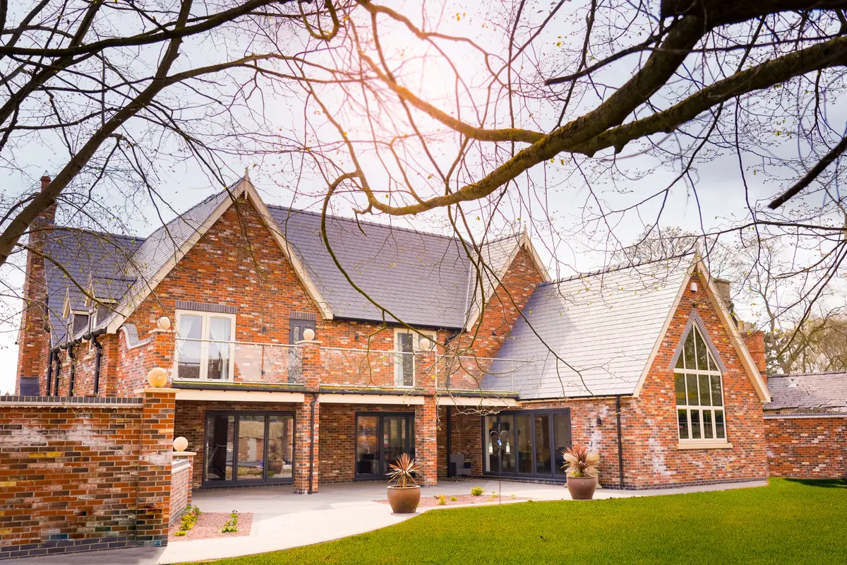 House with new replacement windows and patio sliding doors