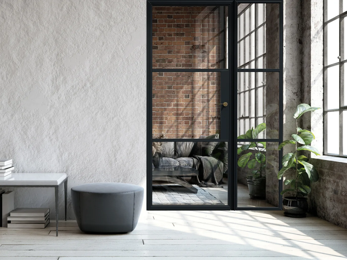 Black slim-framed aluminium glazed internal door and side screen opening into a loft living space
